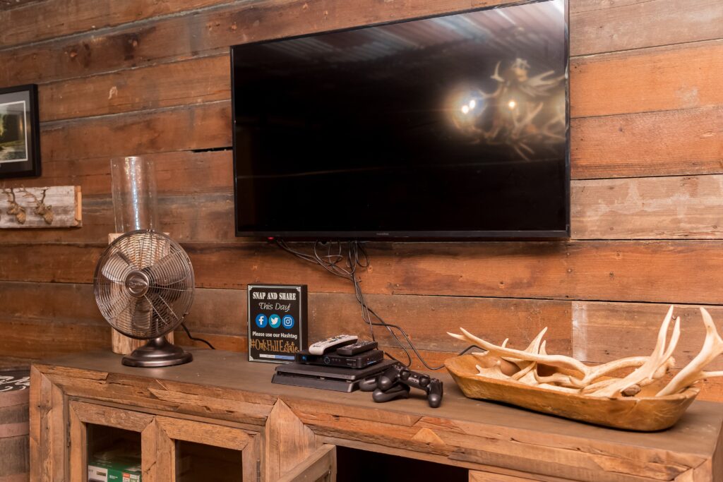 Gaming system in groomsmen's room at Mississippi wedding venue